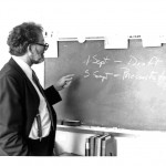 Dock Burke writing on a chalk board in 1987
