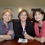 Judy Hall, Sandy Cepica, Jodie Eichblatt seated at a table