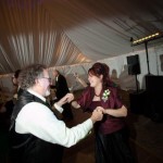 Dock Burke dancing with his daughter at a wedding.